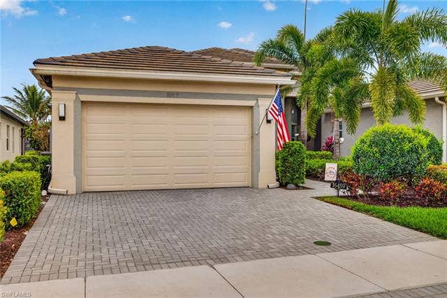 16459 Orinda Way, Bonita Springs, FL 34135 Driveway and sidewalks are wider than standard!