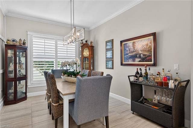 16459 Orinda Way, Bonita Springs, FL 34135 For dinner parties and holidays...extra seating for 8 here! Plantation shutters convey!