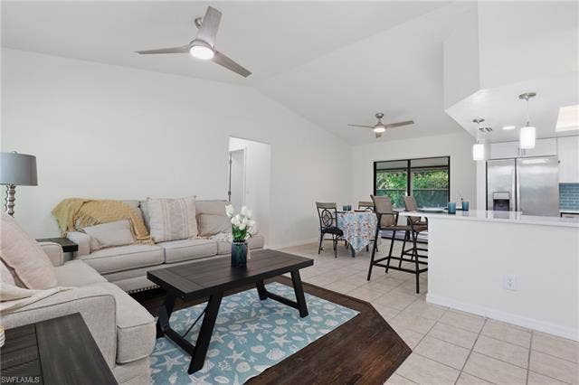 208 Aviation Pkwy, Cape Coral, FL 33904 Living Room with Kitchen view