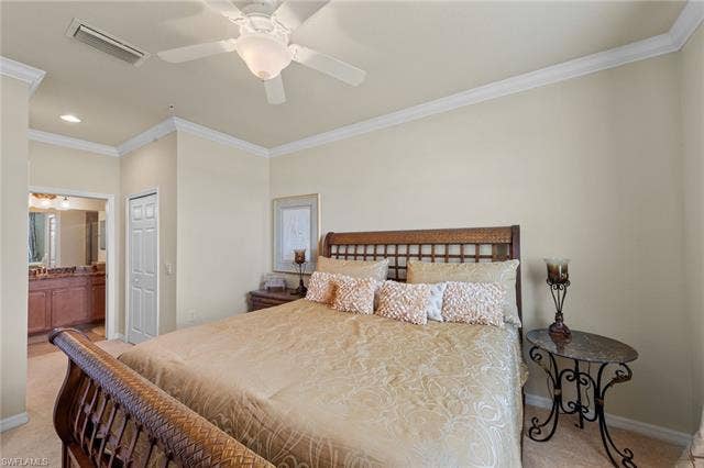 17921 Bonita National Blvd, #244, Bonita Springs, FL 34135 Neutral toned walls and carpeting, crown molding, and a ceiling fan with light fixture