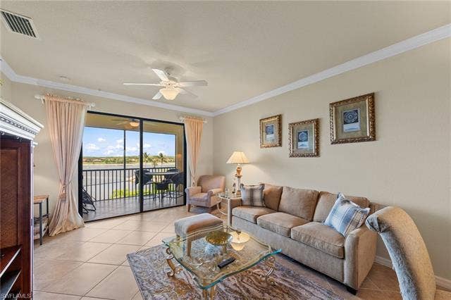 17921 Bonita National Blvd, #244, Bonita Springs, FL 34135 Living area featuring large format tile flooring and crown molding