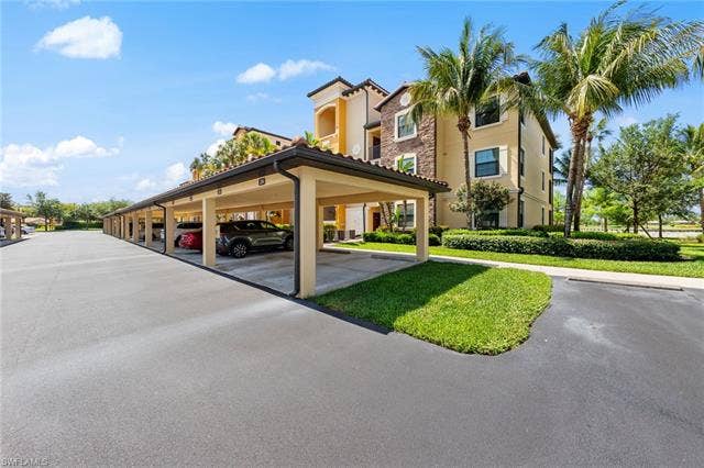 17921 Bonita National Blvd, #244, Bonita Springs, FL 34135 Covered parking structure featuring multiple bays