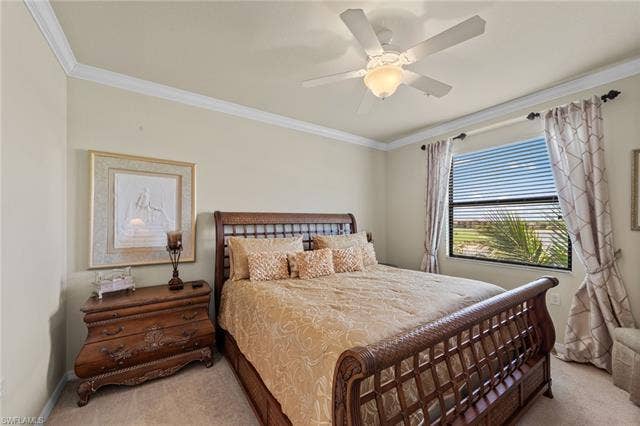 17921 Bonita National Blvd, #244, Bonita Springs, FL 34135 Room with crown molding, a ceiling fan with light fixture, carpeted flooring, and a window with horizontal blinds and drapery