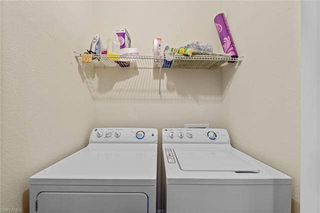 17921 Bonita National Blvd, #244, Bonita Springs, FL 34135 Dedicated laundry area featuring a wire shelving unit