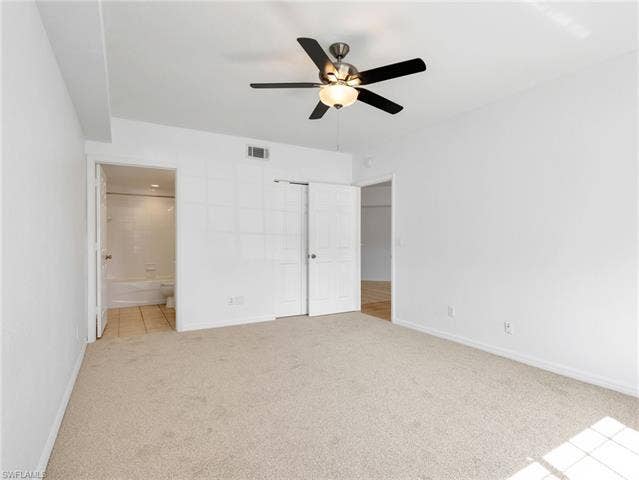 27087 Matheson Ave, #101, Bonita Springs, FL 34135 Primary Ensuite Bedroom & Bathroom + Walk In Closet