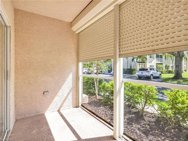 27087 Matheson Ave, #101, Bonita Springs, FL 34135 Screened In Lanai with Electric Hurricane Shutters