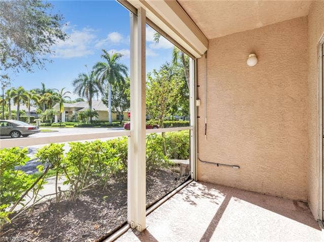 27087 Matheson Ave, #101, Bonita Springs, FL 34135 Screened In Lanai with Electric Hurricane Shutters