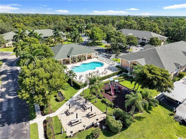 27087 Matheson Ave, #101, Bonita Springs, FL 34135 Aerial View of the Clubhouse, Pool, & Amenities