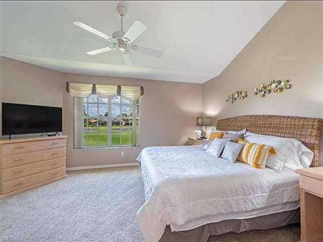 8371 Grand Palm Dr, #2, Estero, FL 33967 Spacious primary bedroom with access to the lanai and fabulous views