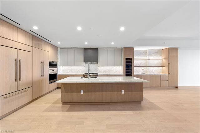 5100 Seagrass Blvd, #503, Bonita Springs, FL 34134 Italkraft Cabinetry, Polished Porcelain, ,Task Lighting, West Bar, 10' Island, 102 Bottle Dual Zone Wine Fridge