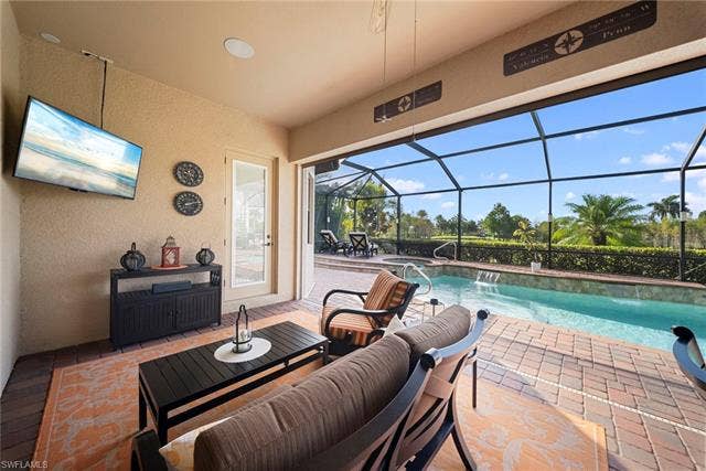 17211 Cherrywood Ct, Bonita Springs, FL 34135 Lanai with TV
