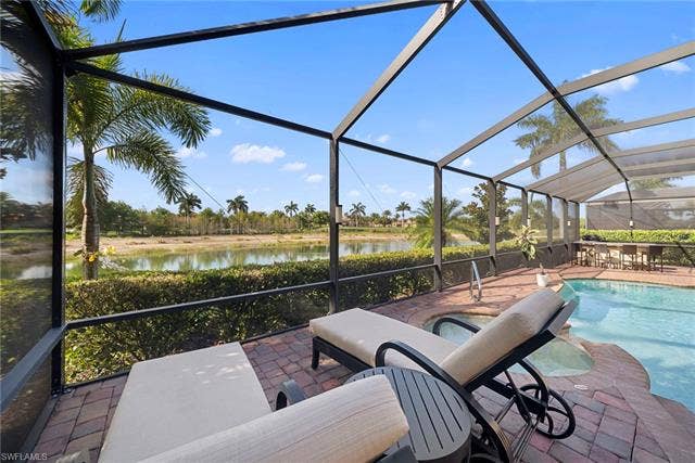 17211 Cherrywood Ct, Bonita Springs, FL 34135 Pool area w/ sunning spot
