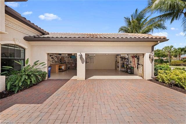 17211 Cherrywood Ct, Bonita Springs, FL 34135 3 Car garage with Bench