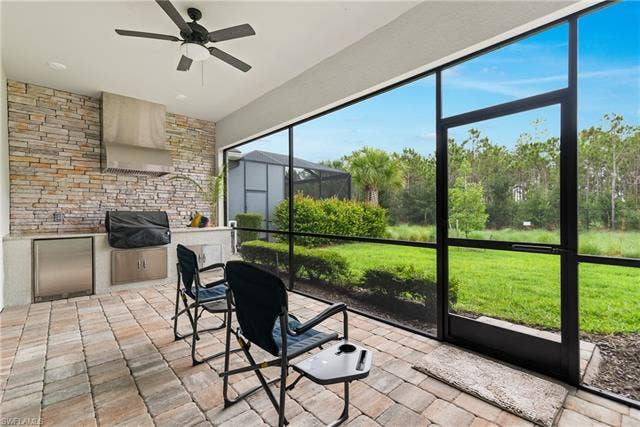 14083 Blue Bay Cir, Fort Myers, FL 33913 Summer Kitchen in screened in Lanai