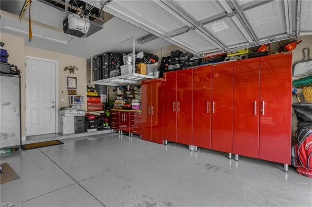 19748 Maddelena Cir, Estero, FL 33967 Custom Cabinets 2 Car Garage
