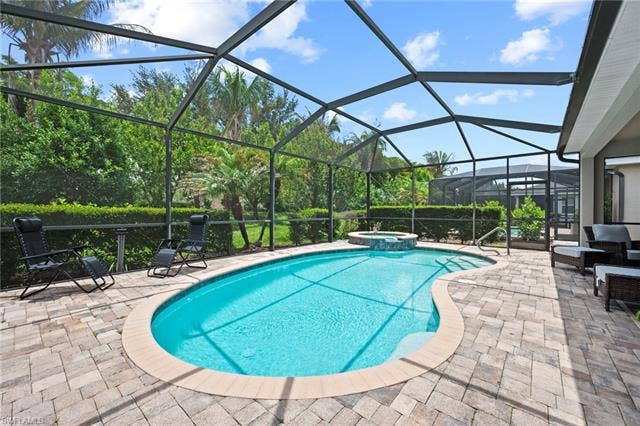 16112 Bonita Landing Cir, Bonita Springs, FL 34135 Screened lanai featuring lush perimeter landscaping