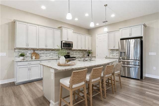 10240 Avonleigh Dr, Bonita Springs, FL 34135 virtually staged