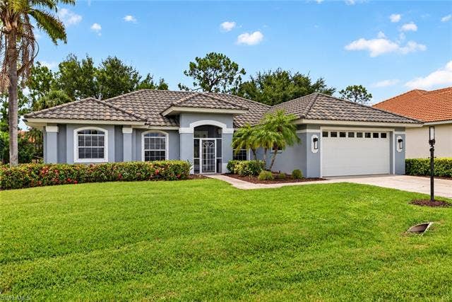 25020 Divot Dr, Bonita Springs, FL 34135 Picture shows what home will look like with new roof being installed Nov/2026.