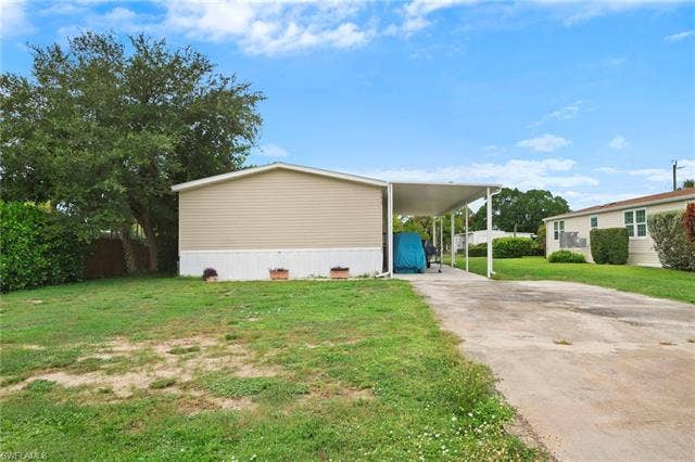 27472 Rue Viauv Ave, Bonita Springs, FL 34135 Front house