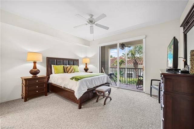 23461 Alamanda Dr, #206, Estero, FL 34135 Spacious room with plush carpet flooring and a ceiling fan