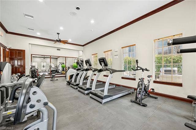 23461 Alamanda Dr, #206, Estero, FL 34135 Dedicated fitness area featuring multiple treadmills and exercise equipment