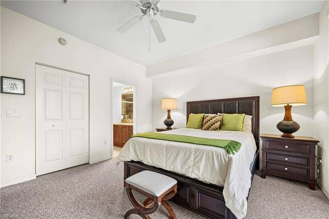 23461 Alamanda Dr, #206, Estero, FL 34135 Bedroom featuring neutral-toned carpeting and light-colored walls