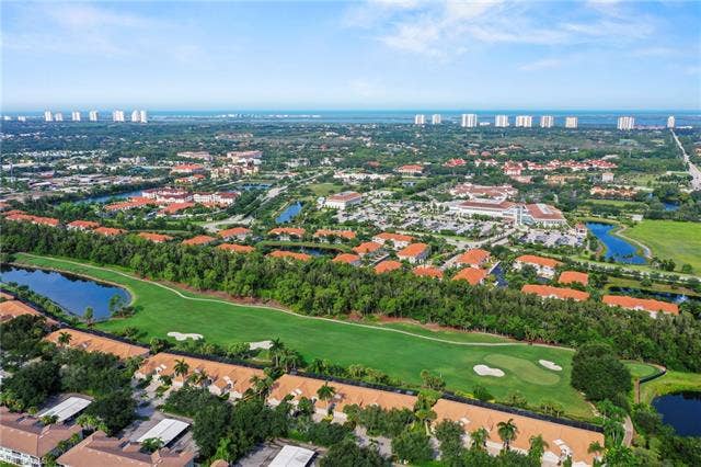 23461 Alamanda Dr, #206, Estero, FL 34135 Expansive golf course frontage with multiple water features