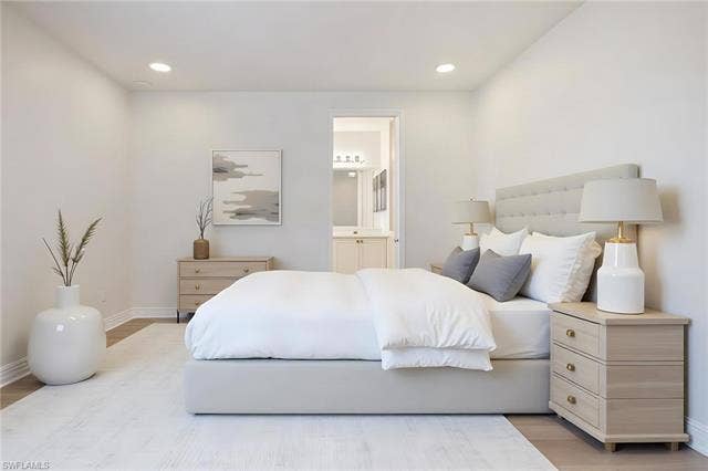 10310 Carolina Willow Dr, Fort Myers, FL 33913 Recessed ceiling lighting, light wood-finish flooring, and a neutral color palette