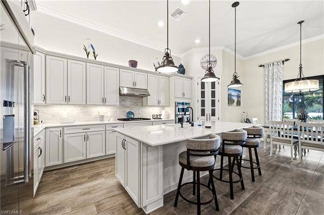 19125 Aqua Shore Dr, Estero, FL 33913 Chef's gourmet kitchen with beautiful walk-in pantry