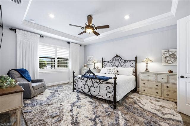 19125 Aqua Shore Dr, Estero, FL 33913 Primary Bedroom with view of lake
