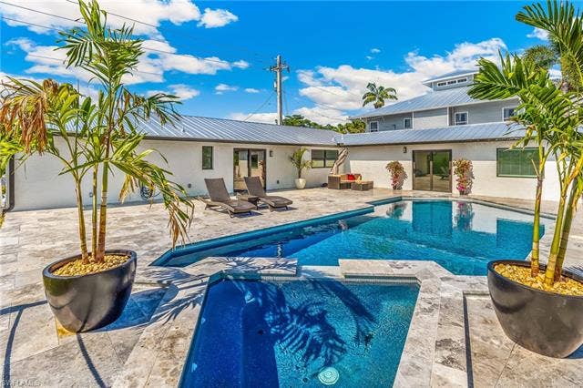 4724 Spring Creek Dr, Bonita Springs, FL 34134 Custom-Designed Pool/Spa