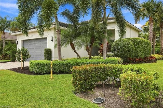 28410 Capraia Dr, Bonita Springs, FL 34135 Beautifully landscaped corner lot on dead end street provides for a large lot and privacy.