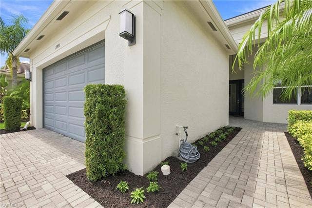 28410 Capraia Dr, Bonita Springs, FL 34135 Front walk way to your front door.