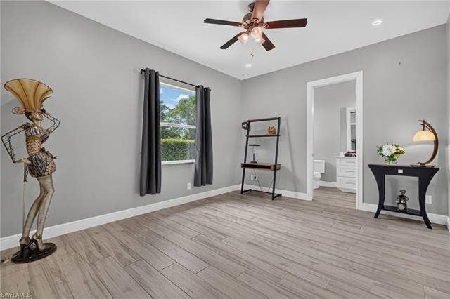 27150 Rue De Paix, Bonita Springs, FL 34135 Guest Bedroom, pocket door to bathroom, custom closet