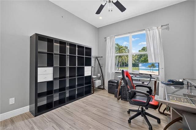 27150 Rue De Paix, Bonita Springs, FL 34135 4th bedroom currently serves as an office, recessed lighting, ceiling fan, and a large window providing natural light