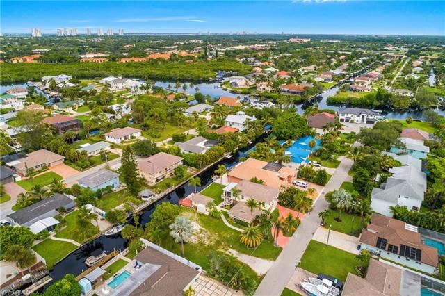 27265 High Seas Ln, Bonita Springs, FL 34135 EXTRA BUILDABLE LOT INCLUDED!! (South side of the home)