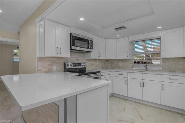 27265 High Seas Ln, Bonita Springs, FL 34135 DOWNSTAIRS FULL KITCHEN