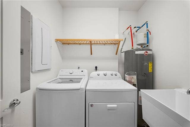 21450 Strada Nuova Cir, #A302, Estero, FL 33928 Laundry room with laundry sink