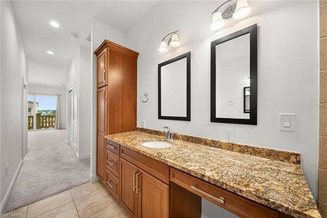 21450 Strada Nuova Cir, #A302, Estero, FL 33928 Dual vanities and sinks in main bathroom