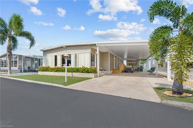 60 Palos Dr, Naples, FL 34104 Beautifully updated home in Blue Skys, a resident-owned 55+ cooperative in central Naples.