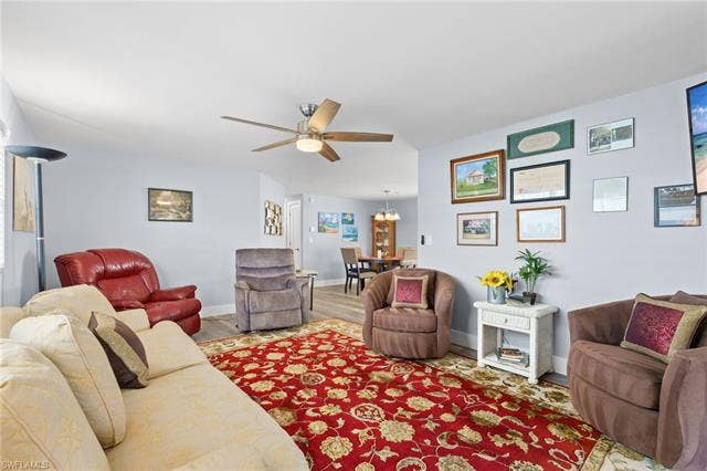 60 Palos Dr, Naples, FL 34104 Comfortable main living area with a bright, open and cohesive design.
