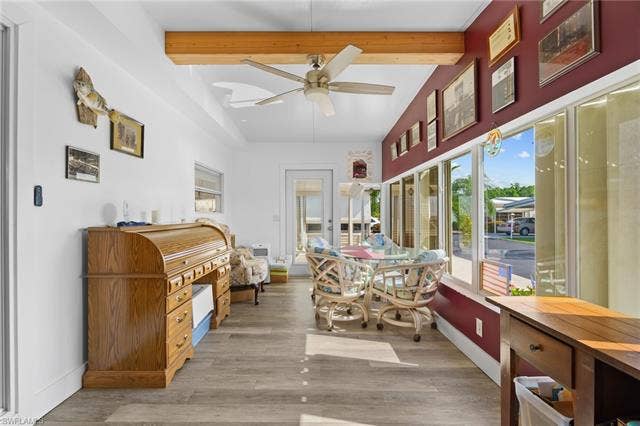 60 Palos Dr, Naples, FL 34104 The 220-square-foot Florida room/den adds valuable enclosed interior space.