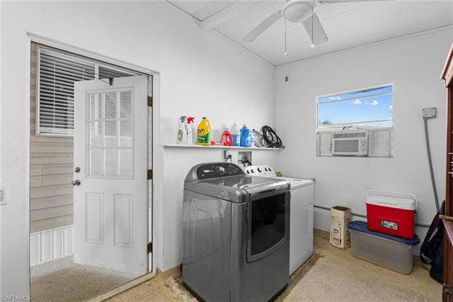 60 Palos Dr, Naples, FL 34104 Leparate laundry and storage room located beneath the main roof.