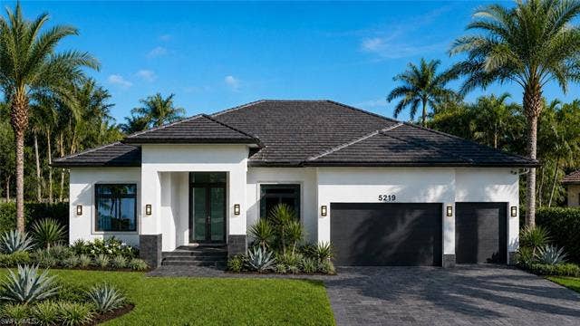 5219 S Seminole Ct, Cape Coral, FL 33904 (Rendered photo) Modern exterior with a light stucco finish and dark tile roof