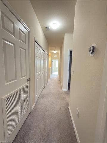 10224 Via Colomba Cir, Fort Myers, FL 33966 Upstairs hallway looking towards Master Bedroom
