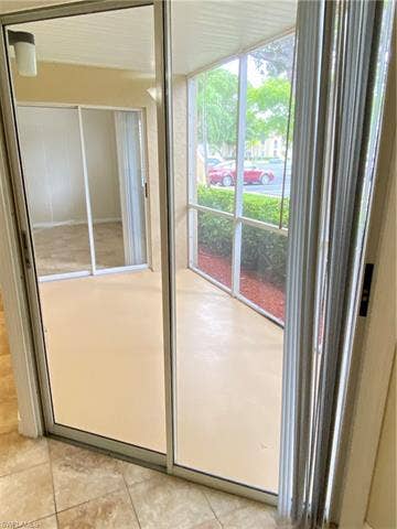 3170 Seasons Way, #804, Estero, FL 33928 Doorwall from Living Room into Lanai