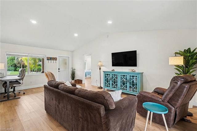 4618 Sierra Ln, Bonita Springs, FL 34134 Vaulted ceilings, recessed lighting, and wood-finish flooring