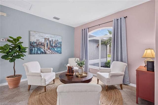 23410 Olde Meadowbrook Cir, Estero, FL 34134 Virtually staged Sitting Area
