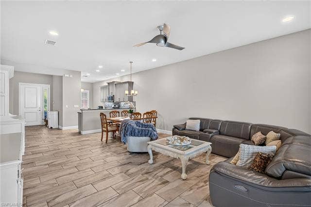 28405 Abruzzo Dr, Bonita Springs, FL 34135 View from sliders to entry; never miss anything while cooking here!