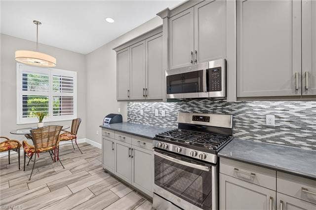 28405 Abruzzo Dr, Bonita Springs, FL 34135 Gorgeous plantation shutters (3 total windows in breakfast nook!) Comfortably seats 4.